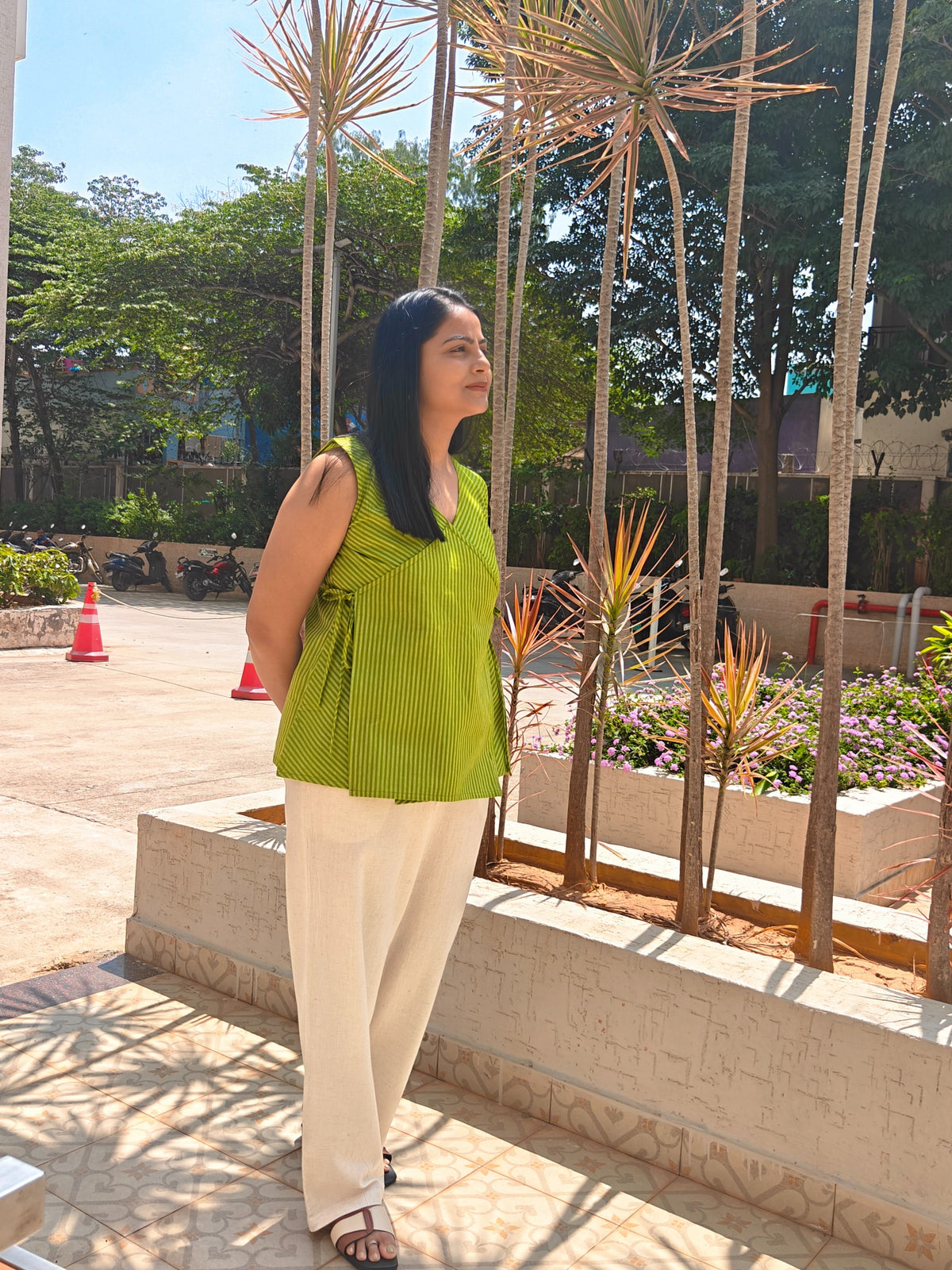 Green striped Angrakha top, full-length outdoor view