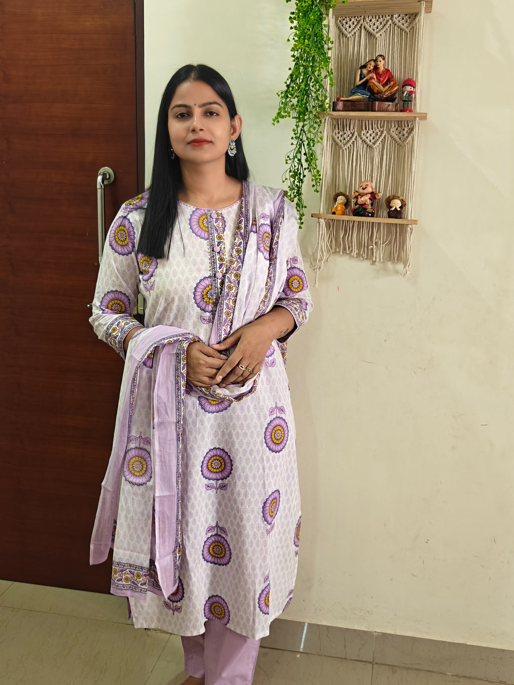 Lavender floral suit with matching dupatta and patterned detailing